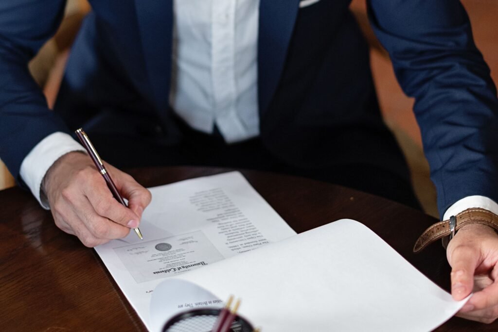 Successor trustee signing legal documents to administer a trust after death